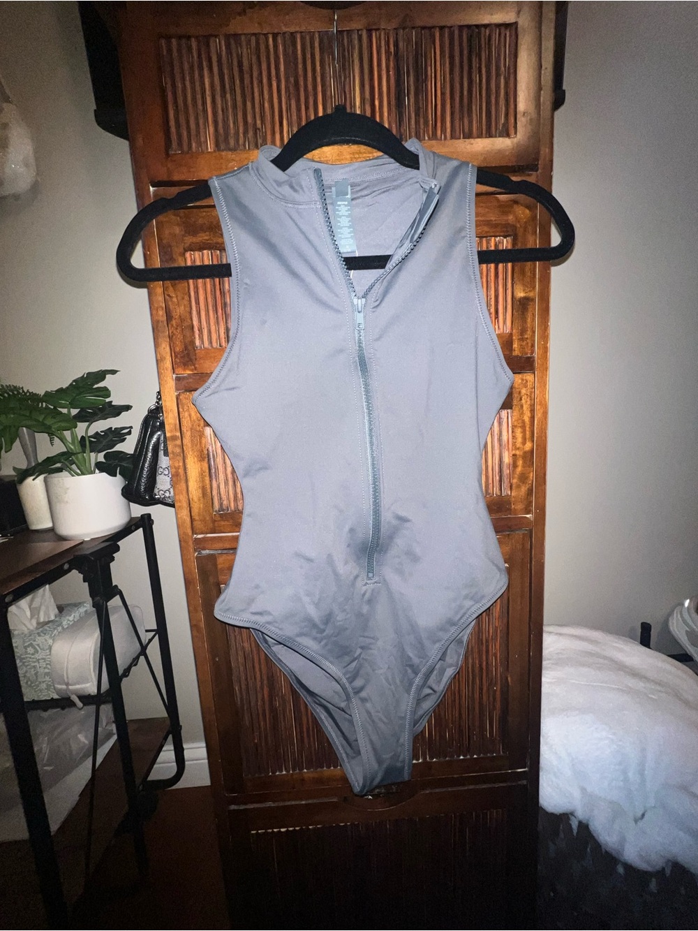 SKIMS Sleeveless Zip-Front One-Piece in Light Gray